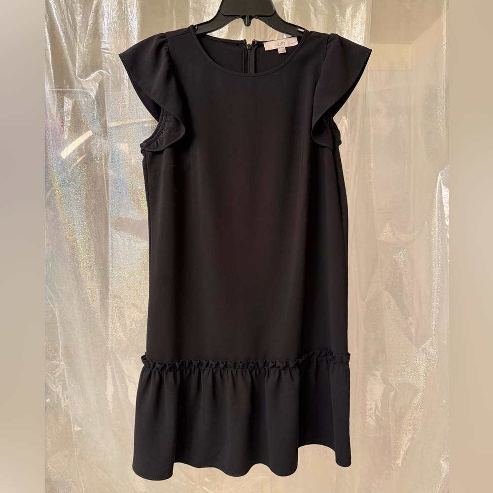 Black dress with ruffle cap sleeves